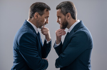 rival strategy of businessmen isolated on grey. business competition and rivalry. rival business company. businessmen having rivalry. rivalry in the business world. solving business problems