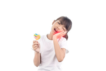 Asian little girl has toothache and hand holding Lollipop isolated on white background with clipping path.