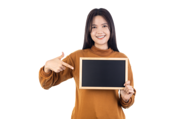 Young Asian woman holding blackboard standing and pointing to it with happy face smiling isolated on white background with clipping path.