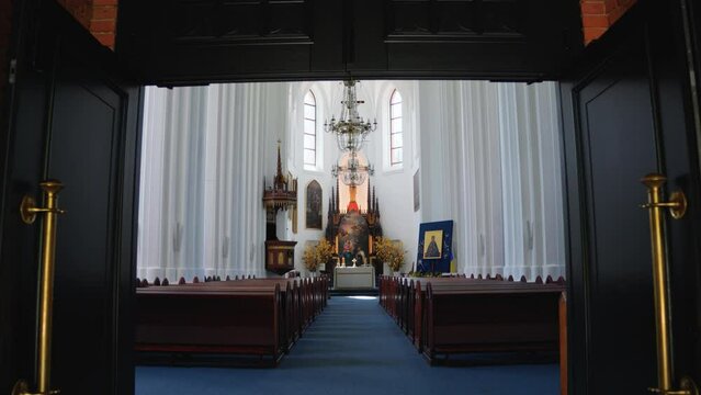 Shot of interior and altar of the Catholic church of Saint Mary's Scapular in Druskininkai, Lithuania, zoom in