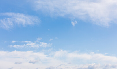 Naklejka na ściany i meble White clouds floating in the blue sky.