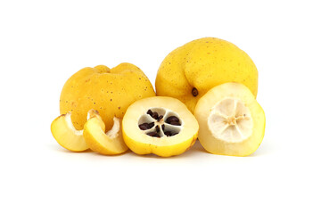 Halved quince with seeds visible over white background