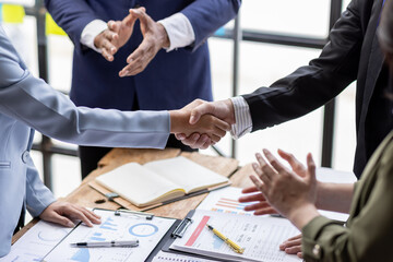 Business Team offer and give hand for handshake in office. Successful job interview. Apply for loan...