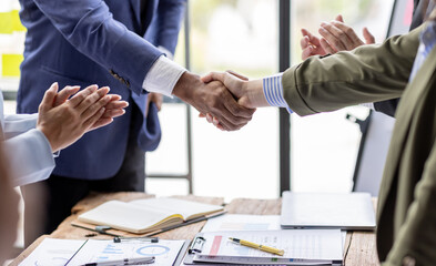 Business Team offer and give hand for handshake in office. Successful job interview. Apply for loan in bank. Salesman, bank worker or lawyer shake for deal, agreement or sale. Increase of salary.	