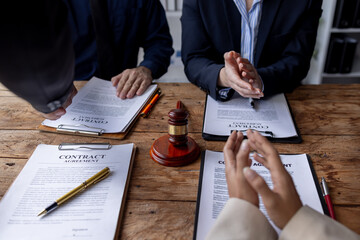 female lawyers working at the law firms. Judge gavel with scales of justice. Legal law, lawyer, advice and justice concept.	
