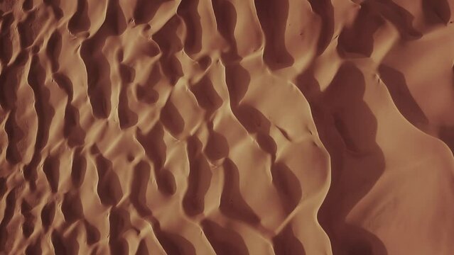 Aerial top view on sand dunes in Sahara desert, Africa, 4k