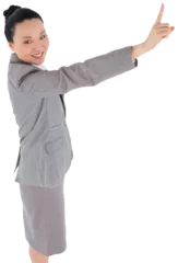 Poster Aziatische plekken Digital png photo of smiling asian businesswoman pointing with finger on transparent background