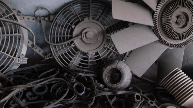 Fans and belts with so much dust taken from old vehicles and replaced at an Auto Shop and Tools, Bangkok, Thailand