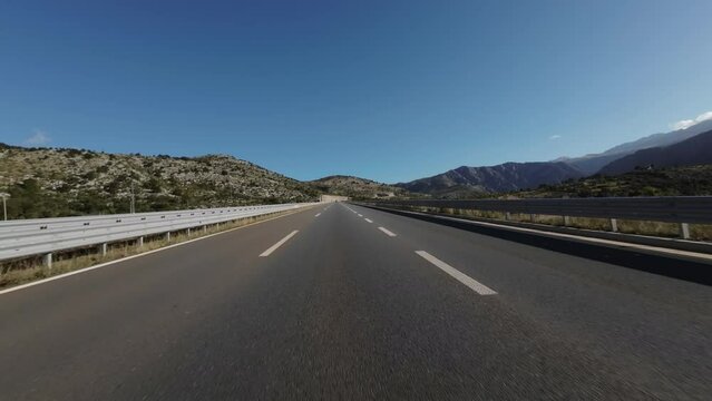 POV fast car driving on the highway road at sunny day, 4k