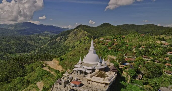 Ella Sri Lanka Aerial v22 drone fly around hillside Mahamevnawa Buddhist Temple in Bandarawela town capturing stupa and panoramic views of mountain landscape - Shot with Mavic 3 Cine - April 2023