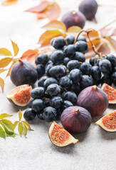Fresh ripe figs and dark grapes