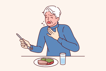 Man choked eating and coughed needing help and blushing feeling lack of air. Elderly person is choking and experiencing problems due to allergy to foodstuffs or poor quality dish served in restaurant