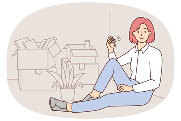 Happy woman holding keys to new home