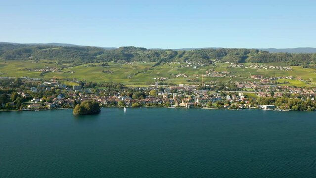 Waterfront Rolle Village In La C&ocirc;te Vineyard In Vaud Canton, Switzerland. Aerial Shot