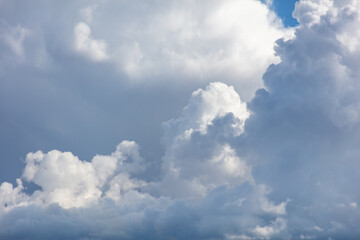 Fototapeta na wymiar White clouds on a blue sky as a background