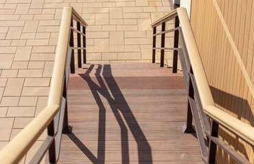 Staircase with shadow near the building