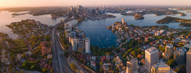 Panoramic aerial view of Sydney City, Sydney Harbour and the Harbour Bridge, NSW Australia on a sunny early morning in November 2023  - obrazy, fototapety, plakaty