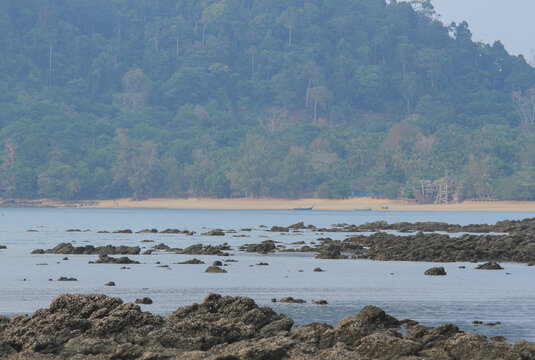 Beautiful view,Rocks at low tide, Khao Kwai Bay, Koh Phayam, Ranong Province, Thailand
