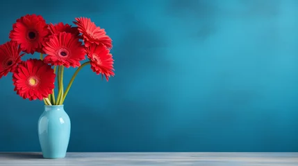 Foto op Canvas A bouquet of bright red gerbera flowers in a vase on a table with a blue wall background, creating a bold and vibrant statement. AI Generated. © 1st footage