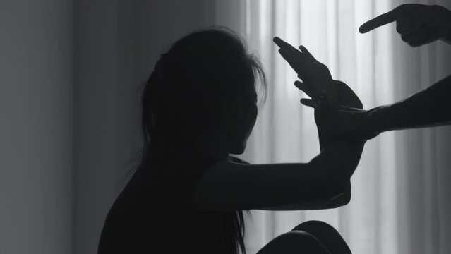 Shadow video of man and woman arguing in bedroom, family crisis Domestic Violence, Concept of Stop Violence Against Women,  Woman Victim of Violence.