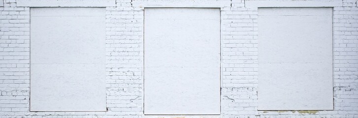 white old brick wall pavement. White brick wall with accents. Space for text. Panorama.