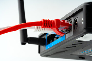 Modern router with cables plugged in close up