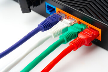Modern router with cables plugged in close up