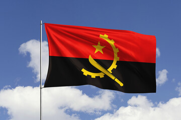 Angola flag fluttering in the wind on sky.
