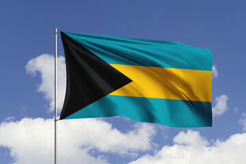 Bahamas flag fluttering in the wind on sky.
