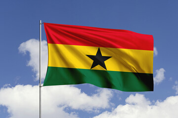 Ghana flag fluttering in the wind on sky.