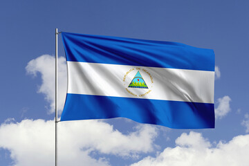 Nicaragua flag fluttering in the wind on sky.