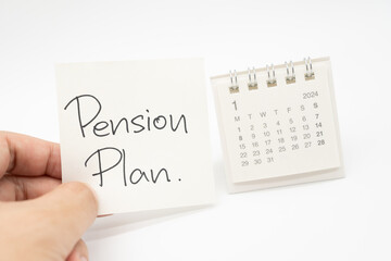 Desk calendar and Pension Plan Note Paper isolated on white background. For retirement, Pension...