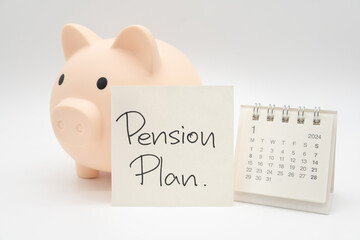 Piggy Bank, Desk calendar and Pension Plan Note Paper isolated on white background. For retirement,...