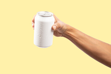 Black male hand holding a fresh white drinking can mockup of beer or soda