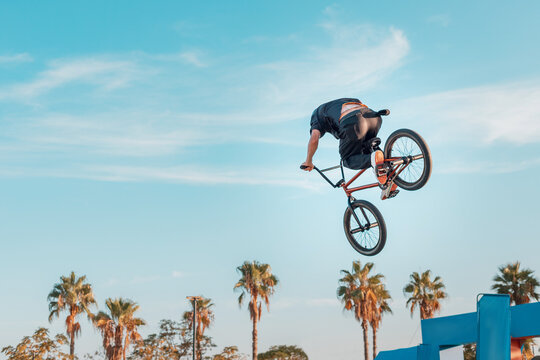 Dynamic BMX event showcasing skilled riders in full action.