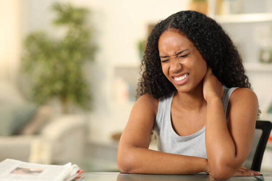 Black Woman Suffering Neck Ache At Home