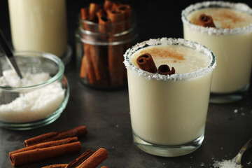 Two glasses with traditional Puerto Rico cocktail Coquito
