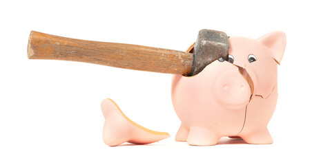 Hammer breaking piggy bank isolated