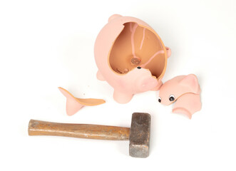 Hammer breaking piggy bank isolated
