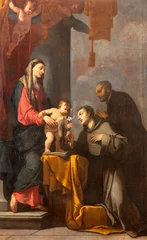 Fototapeten VICENZA, ITALY - NOVEMBER 5, 2023: The painting of Madonna with the St. Anthony of Padova and St. Gaetan  in the chruch Chiesa di San Lorenzo by Giulio Carpioni (1611 - 1674). © Renáta Sedmáková