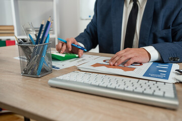  businessman accounting financial document, annual company report, office workplace
