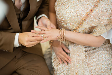 Fototapeta premium wear a ring, wedding ring, love couple