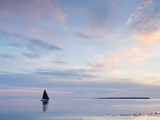 Yacht on sea during sunset