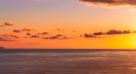 Fototapeta premium scenic landscape of colorful sunset or sunrise above water, evening or morning seascape