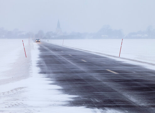 Snow on country road during winter