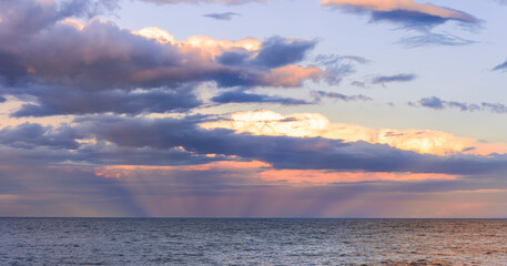amazing evening or morning sea shore landscape of blue water, rock coast and unique natural...