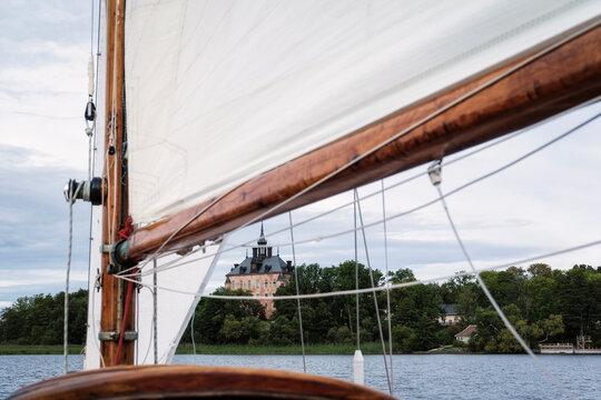 Mast of yacht and Castle Wiks on Lake Malaren, Sweden