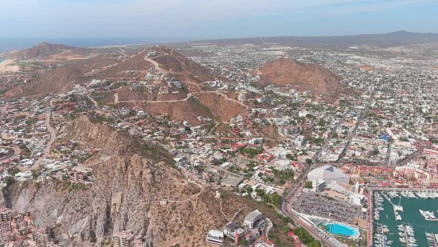 Mexico, Cabo San Lucas: Aerial view of famous resort city on southern tip of Baja California peninsula - landscape panorama of Latin America from above