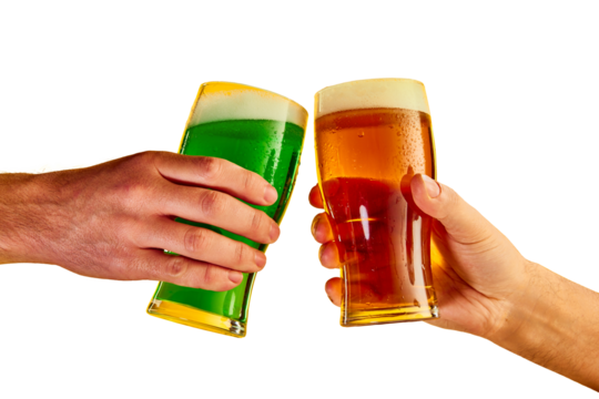 Cheers. Hands clinking green and lager foamy beer glasses isolated on transparent background. Concept of st patrick's day celebration, brewery, traditions, alcohol drinks, taste, Irish holiday