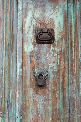 old rusty lock on wooden door
